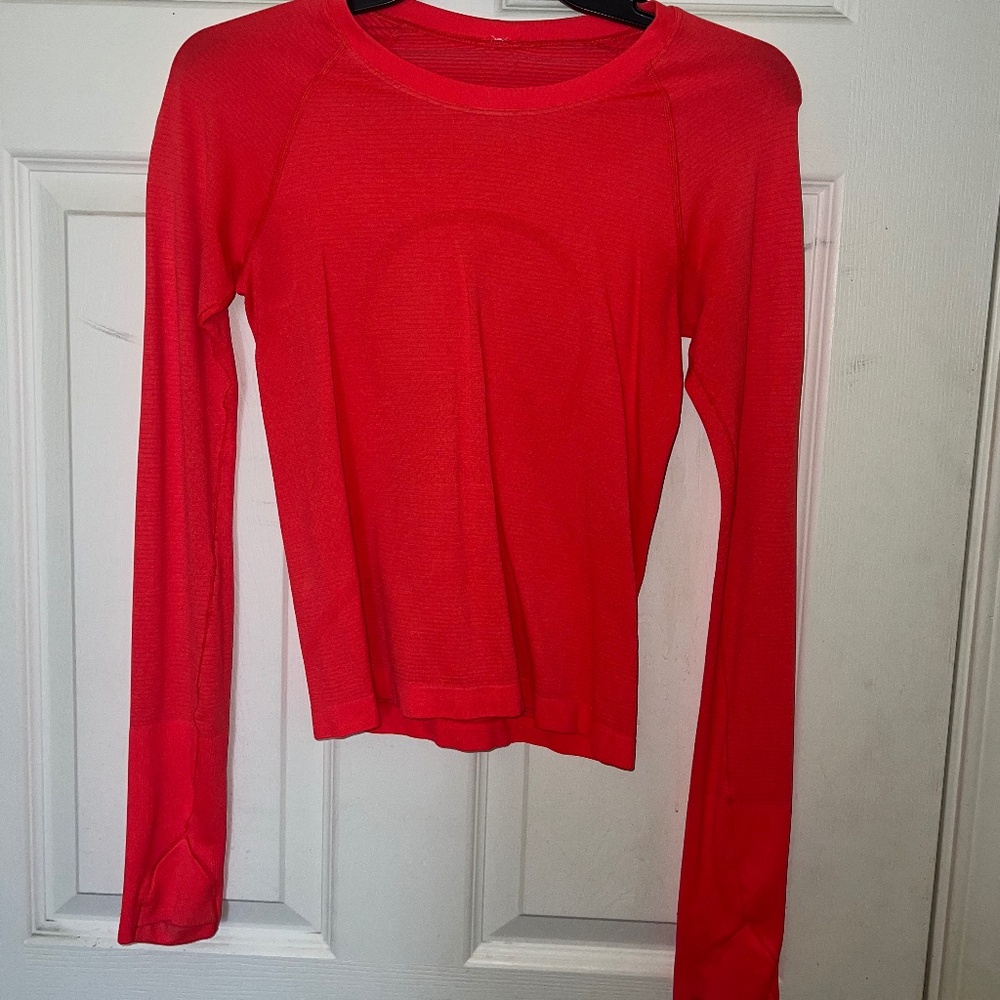 lululemon orange flare swiftly tech race length size 4